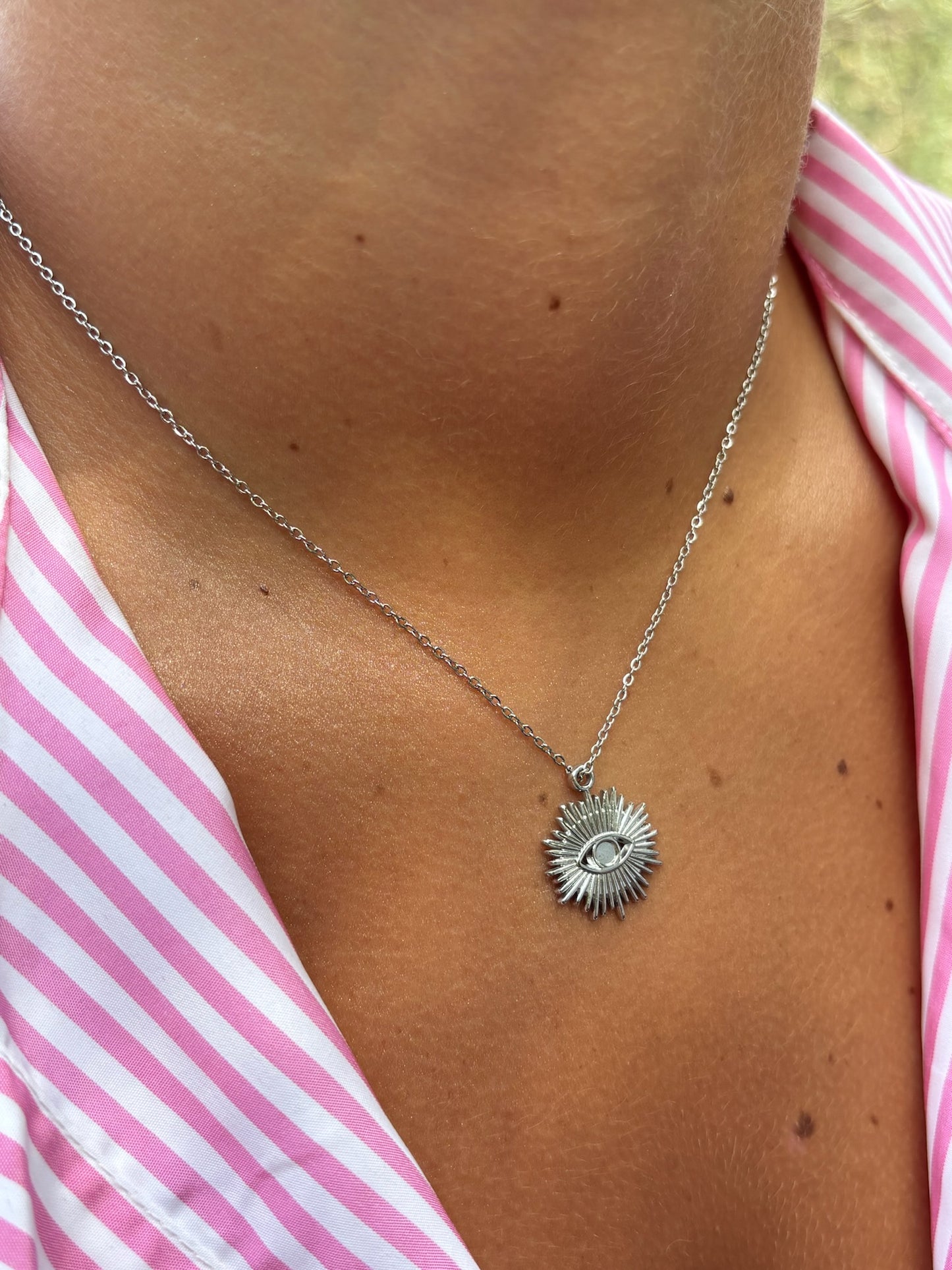 Collier soleil oeil