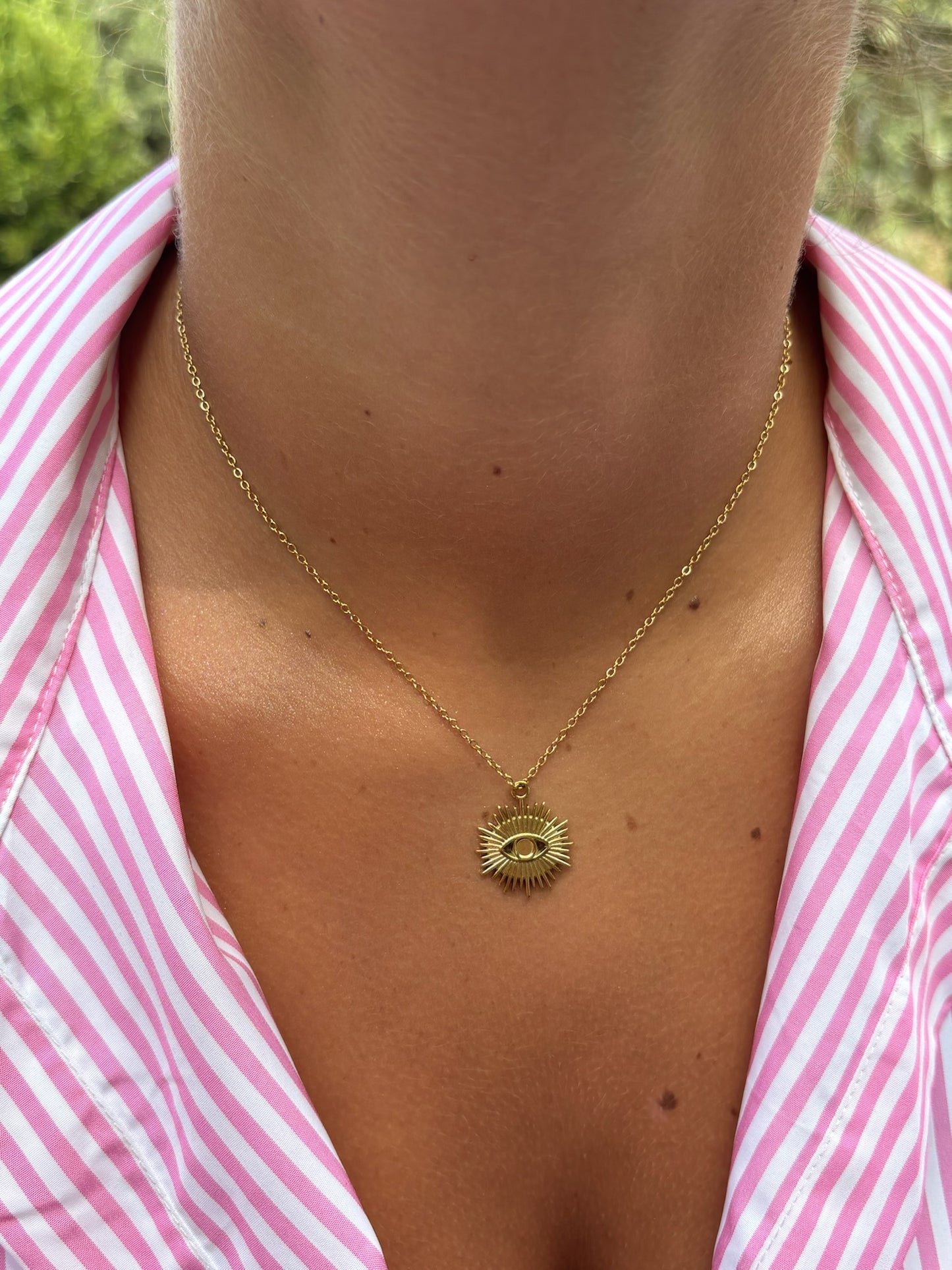 Collier soleil oeil