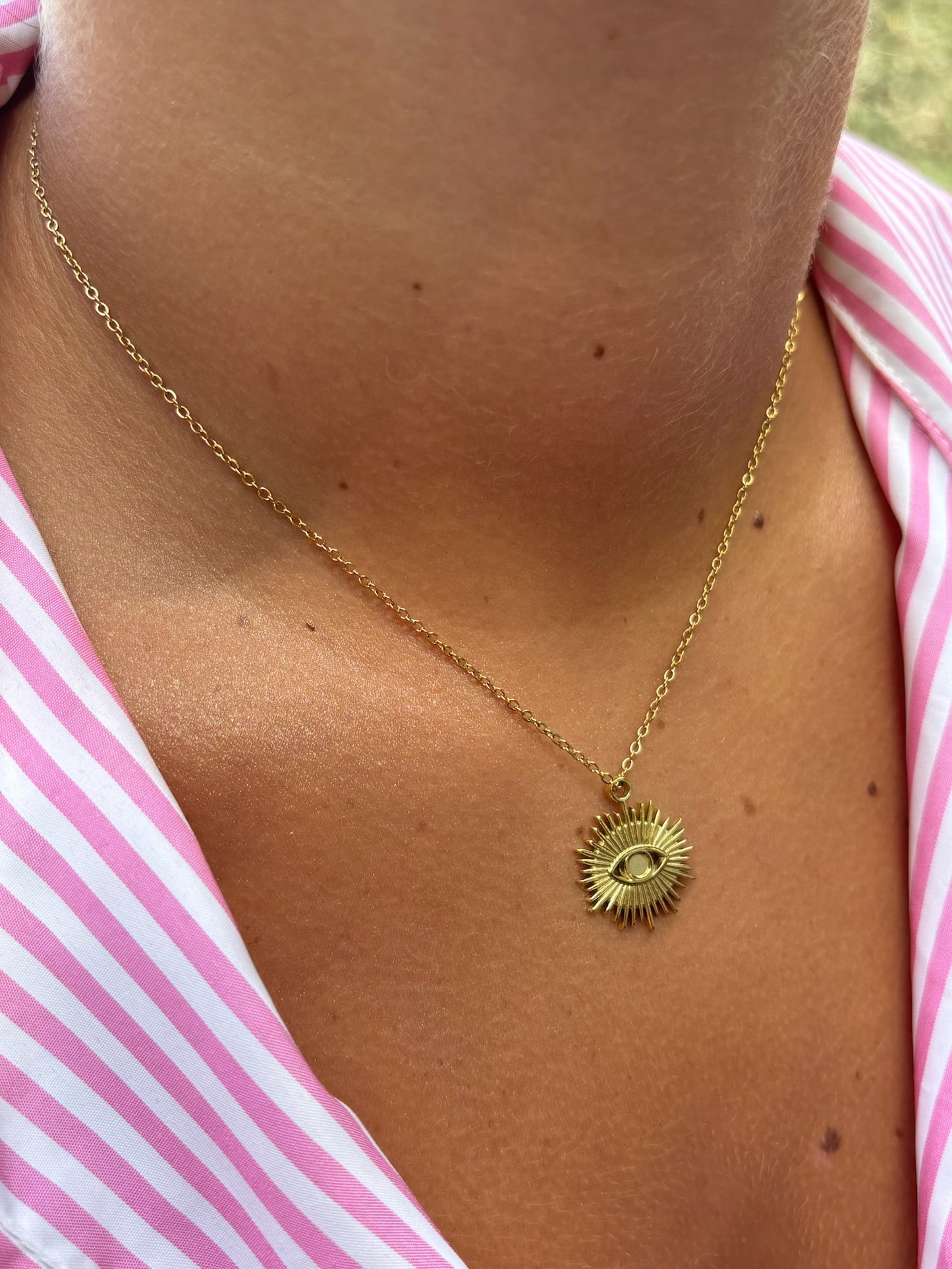 Collier soleil oeil