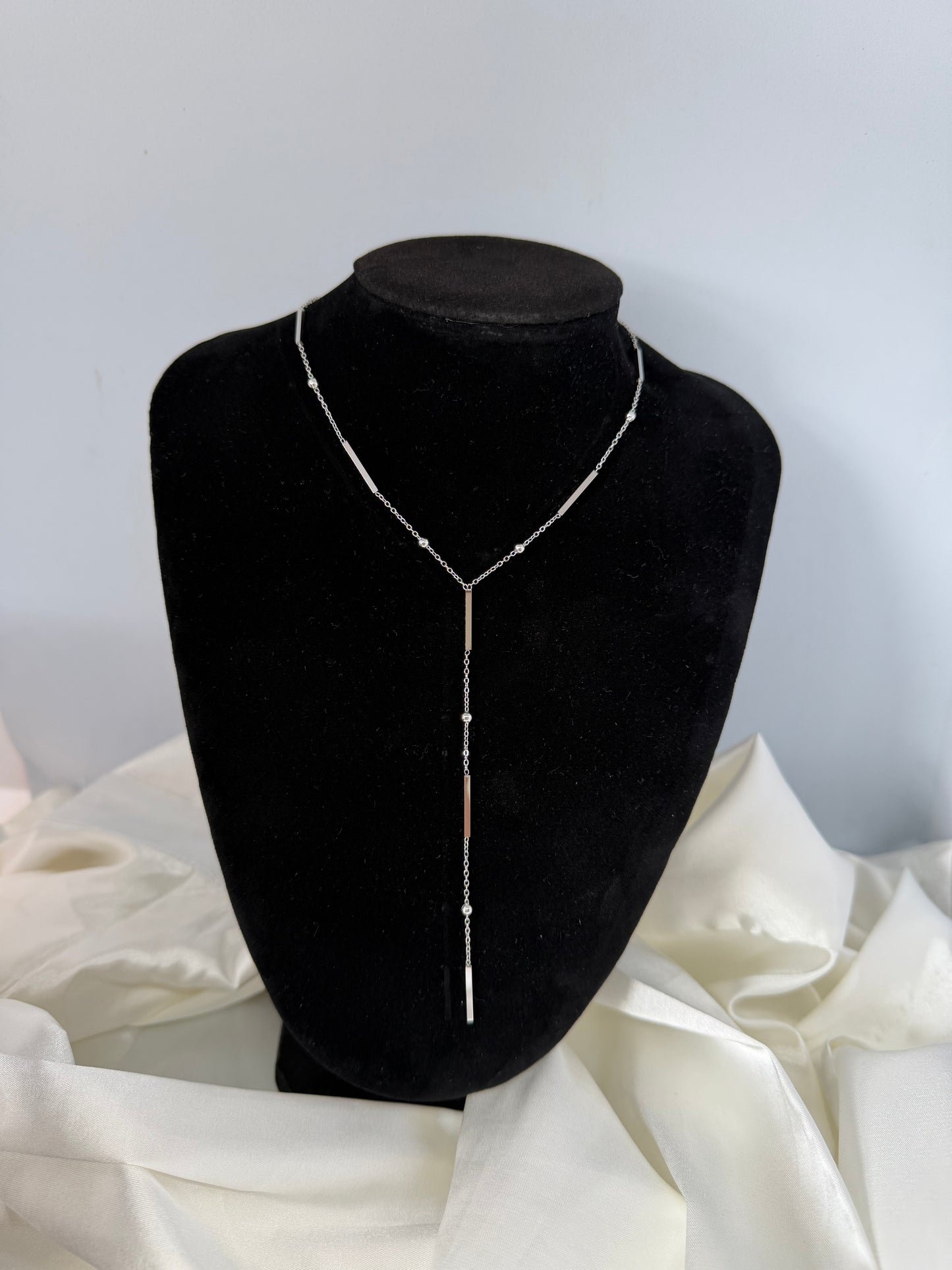 Collier longue barre