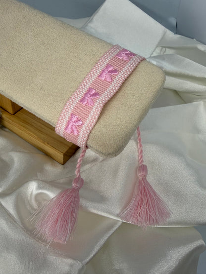 Bracelet tissu noeud rose