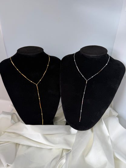 Collier longue barre