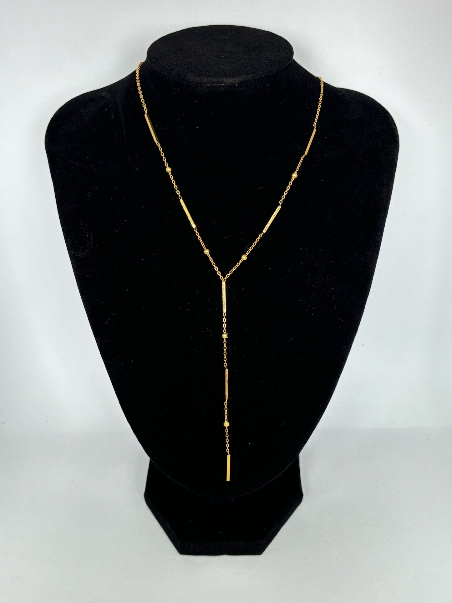 Collier longue barre