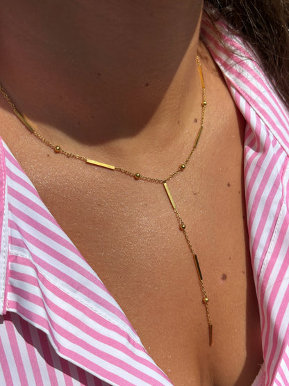 Collier longue barre